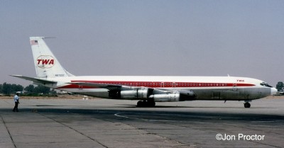  Meeting TWA 707s during our ground stops at Cairo provided a reminder of home and usually U.S. newspapers. 707-331B N8705T is seen arriving with its No. 4 engine thrust reverser stuck in the open position.