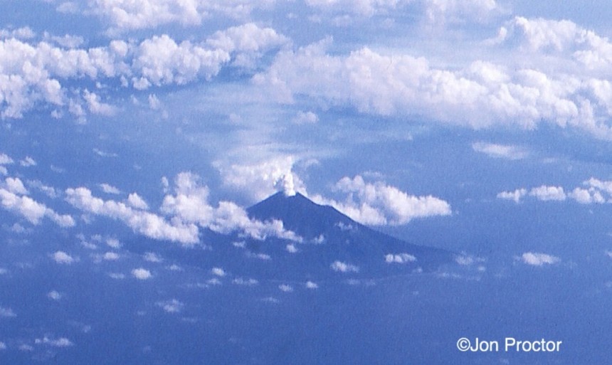 A volcano erupting on the island nation of New Hebrides.